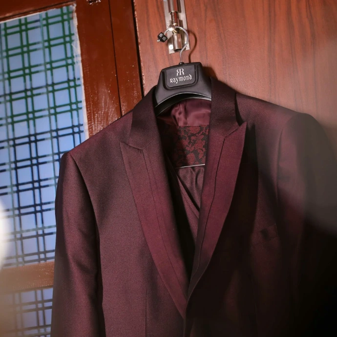 a man wearing a suit and tie